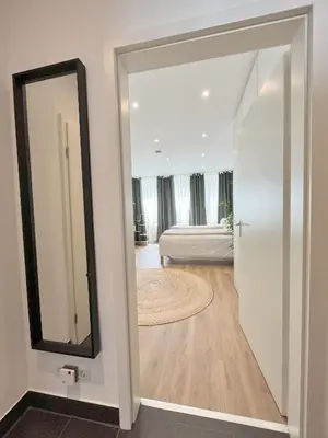 Ein Bett oder Betten in einem Zimmer der Unterkunft Goldstadt Apartments Pforzheim