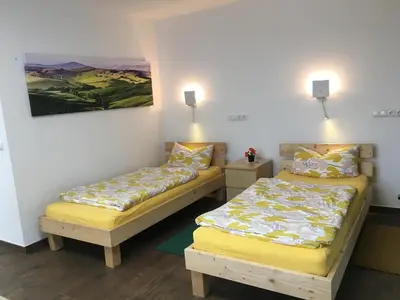 Ein Bett oder Betten in einem Zimmer der Unterkunft Helles neues Appartement