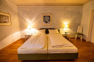 Ein Bett oder Betten in einem Zimmer der Unterkunft Hotel & Restaurant Zum Riesen