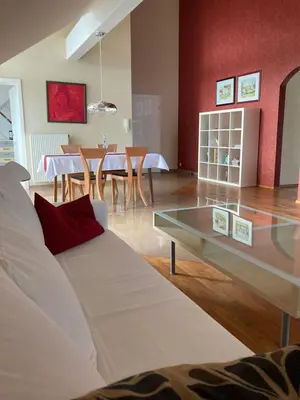 Ein Bett oder Betten in einem Zimmer der Unterkunft Ferienwohnung Rosengarten