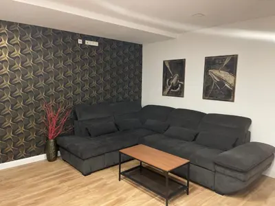 Ein Sitzbereich in der Unterkunft Propeller Gästehaus EG