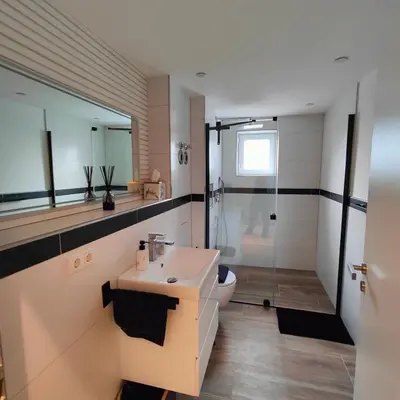 Ein Badezimmer in der Unterkunft Exklusiv, modernes Apartment