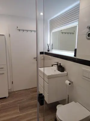 Ein Badezimmer in der Unterkunft Exklusiv, modernes Apartment