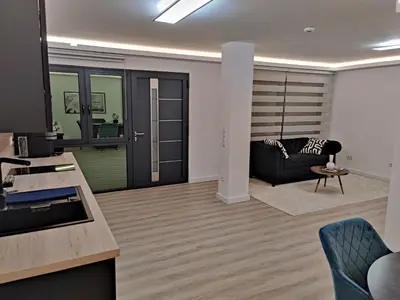 Ein Sitzbereich in der Unterkunft Exklusiv, modernes Apartment