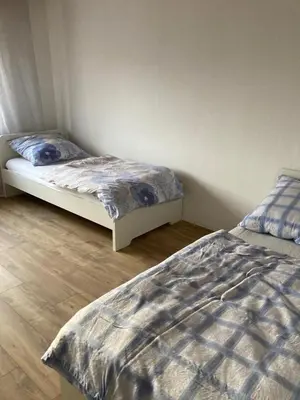 Ein Bett oder Betten in einem Zimmer der Unterkunft Monteurunterkunft Wiesental