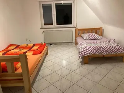 Ein Bett oder Betten in einem Zimmer der Unterkunft Monteurunterkunft Wiesental