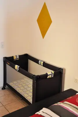Ein Bett oder Betten in einem Zimmer der Unterkunft Ferienwohnung Mörlenbach Altstadt