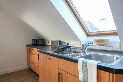 Küche/Küchenzeile in der Unterkunft nJoy! Design Apartment - Audi Zentrum & Balkon