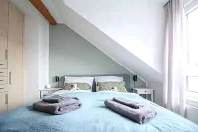 Ein Bett oder Betten in einem Zimmer der Unterkunft nJoy! Design Apartment - Audi Zentrum & Balkon