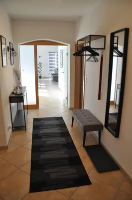 Ein Bett oder Betten in einem Zimmer der Unterkunft Schnurs Ferienwohnung