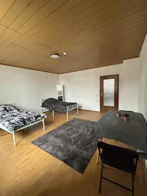 Ein Bett oder Betten in einem Zimmer der Unterkunft 1 Zimmer für 2 Personen Bruchsal