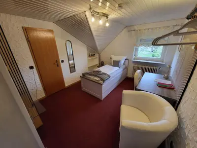 Ein Bett oder Betten in einem Zimmer der Unterkunft Hotel Schönblick