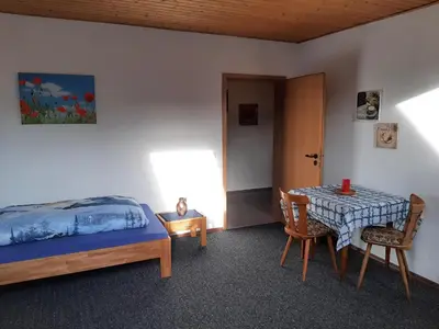 Ein Bett oder Betten in einem Zimmer der Unterkunft Gästezimmer Löhrbacher Tal