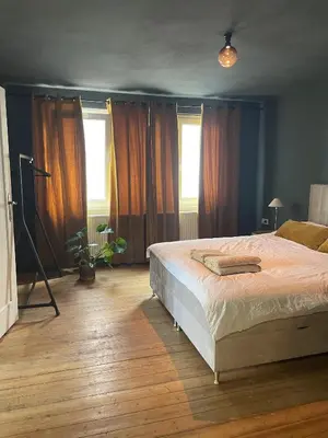 Ein Bett oder Betten in einem Zimmer der Unterkunft Schöne Apartments auf dem Weingut Schätzel