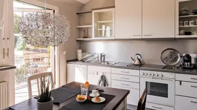 Küche/Küchenzeile in der Unterkunft Charmante, großzügige Ferienwohnung Villa Fleurie