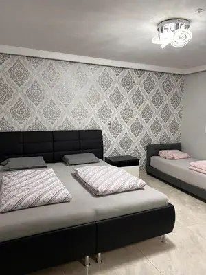Ein Bett oder Betten in einem Zimmer der Unterkunft LK FeWo
