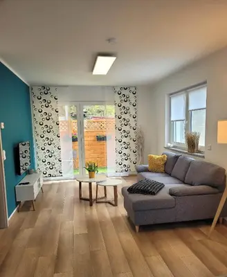 Ein Sitzbereich in der Unterkunft Ferienwohnung Hanek