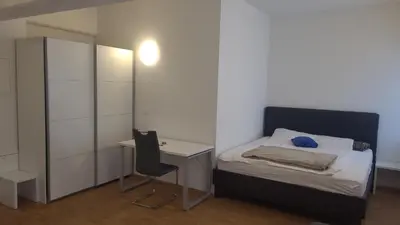 Ein Bett oder Betten in einem Zimmer der Unterkunft Apartment Nordbergstrasse