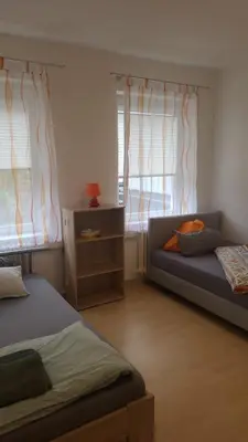 Ein Bett oder Betten in einem Zimmer der Unterkunft Apartments Sülmerstrasse