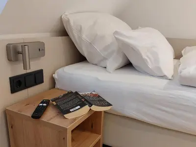 Ein Bett oder Betten in einem Zimmer der Unterkunft Gasthaus zum Ochsen