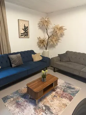 Ein Sitzbereich in der Unterkunft Tiger Apartment
