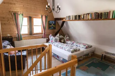 Ein Bett oder Betten in einem Zimmer der Unterkunft Ferienhaus Pfalzklause