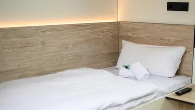 Ein Bett oder Betten in einem Zimmer der Unterkunft Roatel Hirschberg an der Bergstraße (A5) my-roatel-com