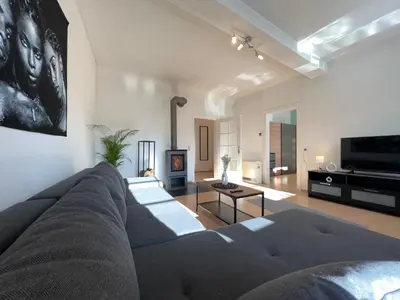 Ein Sitzbereich in der Unterkunft Romantisches Kamin-Apartment by Rabe - Gartenabteil, Smart-TV, Netflix