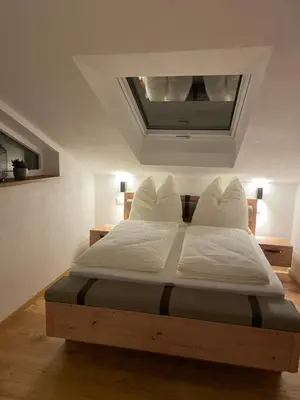 Ein Bett oder Betten in einem Zimmer der Unterkunft Die Römer