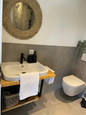 Ein Badezimmer in der Unterkunft Die Römer