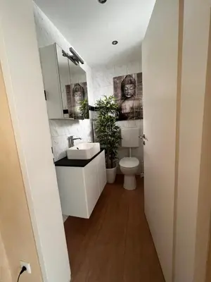 Ein Badezimmer in der Unterkunft Wohnung Löwenstein
