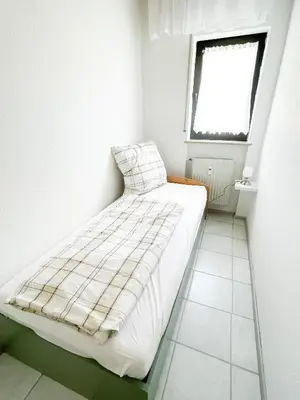 Ein Bett oder Betten in einem Zimmer der Unterkunft Ferienwohnung Balu