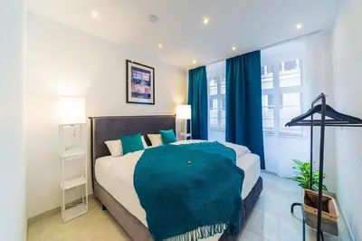Ein Bett oder Betten in einem Zimmer der Unterkunft Lit Living: Luxury - Box Spring - Zwischen MA und HD - Netflix - 8 Personen