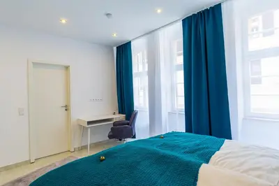 Ein Bett oder Betten in einem Zimmer der Unterkunft Lit Living: Luxury - Box Spring - Zwischen MA und HD - Netflix - 8 Personen