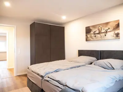 Ein Bett oder Betten in einem Zimmer der Unterkunft Pension HSL