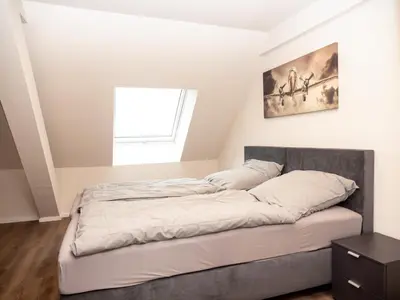 Ein Bett oder Betten in einem Zimmer der Unterkunft Pension HSL