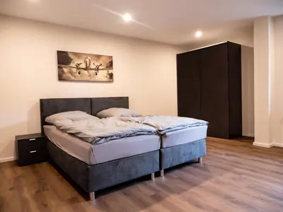 Ein Bett oder Betten in einem Zimmer der Unterkunft Pension HSL