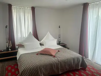 Ein Bett oder Betten in einem Zimmer der Unterkunft Wohnen am Seebach