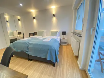 Ein Bett oder Betten in einem Zimmer der Unterkunft Lux Apartment near Frankfurt!