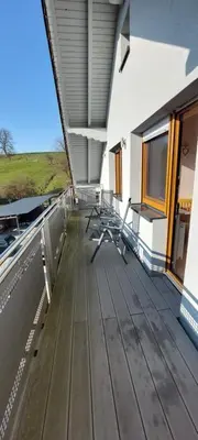 Ein Balkon oder eine Terrasse in der Unterkunft Große tolle 4 Zimmer Ferienwohnung im Herzen des Odenwaldes