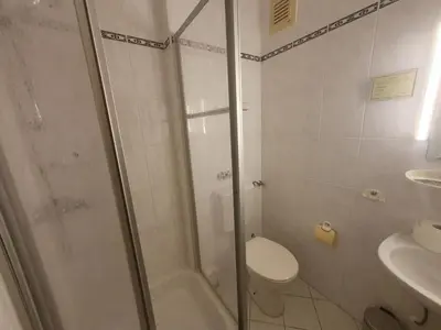 Ein Badezimmer in der Unterkunft App 24 Gästehaus Zwingenberg