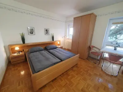Ein Bett oder Betten in einem Zimmer der Unterkunft App 24 Gästehaus Zwingenberg