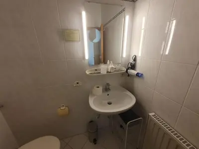 Ein Badezimmer in der Unterkunft App 24 Gästehaus Zwingenberg