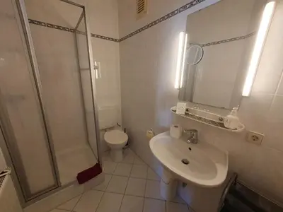Ein Badezimmer in der Unterkunft App 21 Gästehaus Zwingenberg