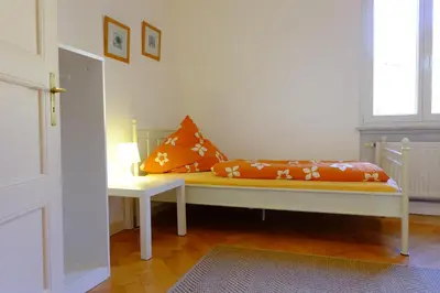 Ein Bett oder Betten in einem Zimmer der Unterkunft heidel-home 3Raum Wohnung