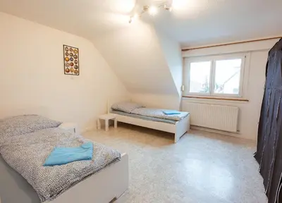 Ein Bett oder Betten in einem Zimmer der Unterkunft Monteurunterkunft Heilbronn