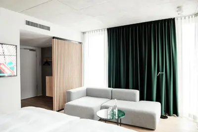 Ein Bett oder Betten in einem Zimmer der Unterkunft Coreum Hotel