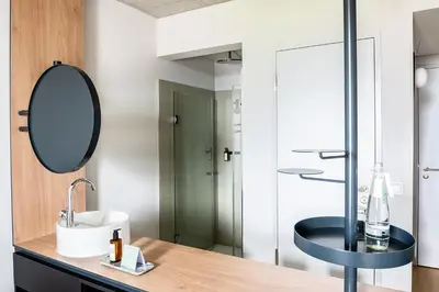 Ein Badezimmer in der Unterkunft Coreum Hotel