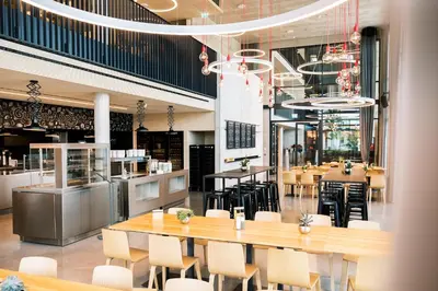 Ein Restaurant oder anderes Speiselokal in der Unterkunft Coreum Hotel