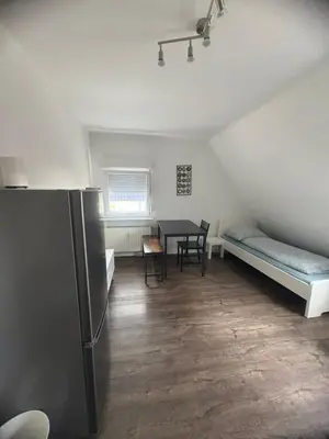 Ein Bett oder Betten in einem Zimmer der Unterkunft Monteurwohnung mit Parkplatz - Besigheim